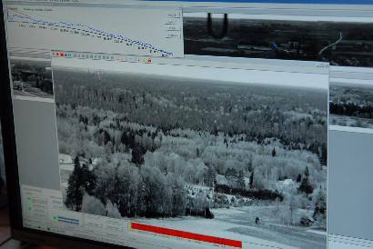 Taip per miškininkų kameras atrodo vaizdas esantis beveik už 7 kilometrų nuo stebėjimo kameros.