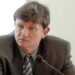 Seimo narys Sergejus Jovaiša baisisi finansų viceministro Vytauto Galvono kalbomis. Jono JUNEVIČIAUS nuotr.