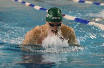 Giedrius Titenis finišuoja 100 m. plaukime krūtine. Autoriaus nuotr.