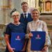 Inauguracijos į bajorus ceremonija Palėvenės šv. Dominyko bažnyčioje Loreta Stonienė (kairėje) kartu su vaikais Liudu ir Ugne. 2026 metų liepos 25 diena.